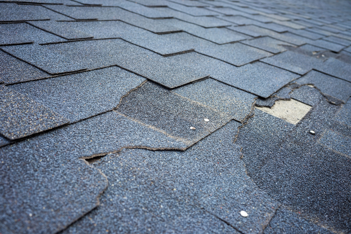 A roof with broken shingles in Euclid.